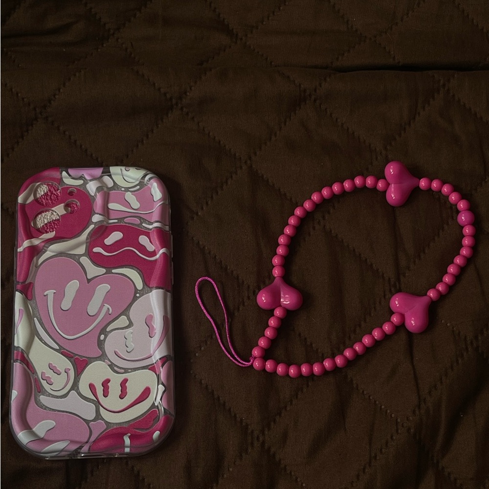 Pink iPhone 12 mini case with hearts-smiley faces